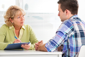 Doctor talking to patient